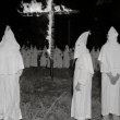 oded Ku Klux Klansmen posed for this exclusive picture Sept. 2, 1962 as they burn a cross as part of a statewide demonstration against racial integration in Talluah, Louisiana